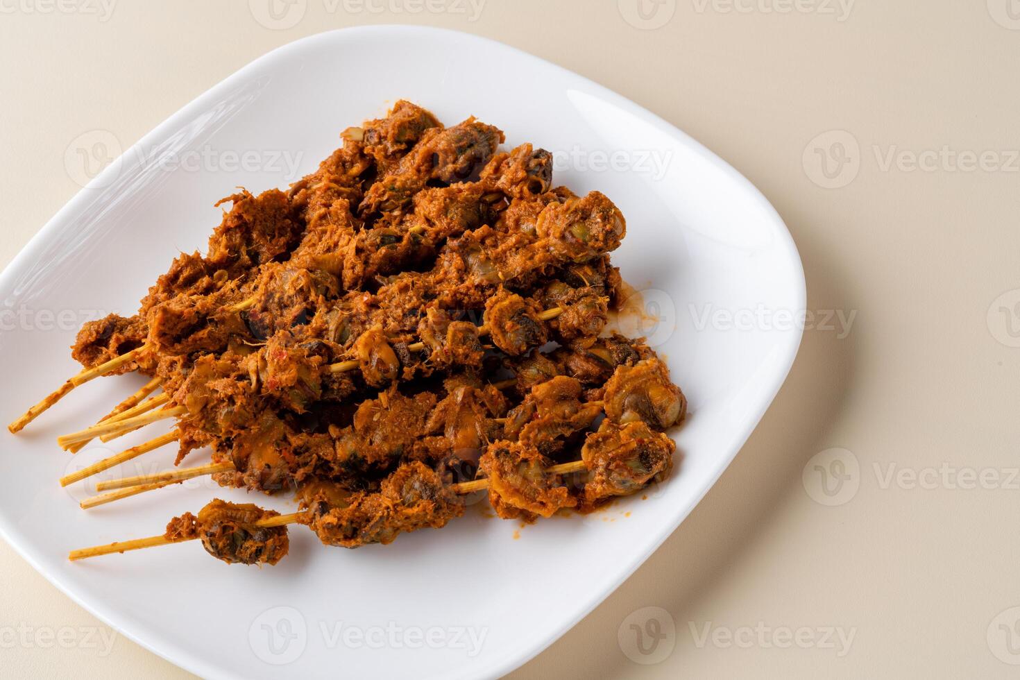 Sate Kerang Or Satay Kerang is a Traditional Indonesian Food made from Shell and covered with sauce. Sate Kerang Angkringan. photo