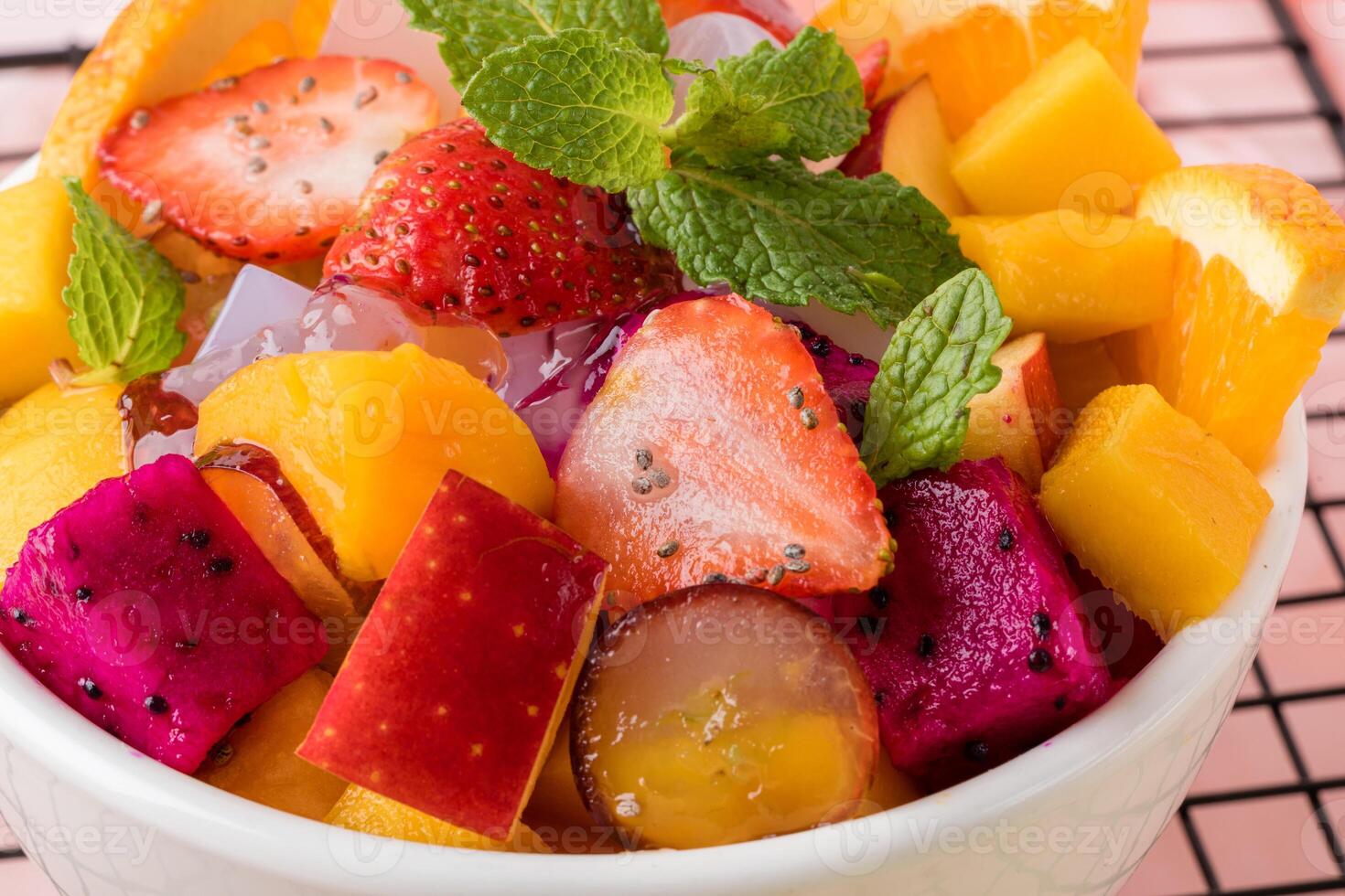 Fruit salad is a dish consisting of various kinds of fruit. fruit salad can be served as an appetizer, a side salad, or a dessert. photo