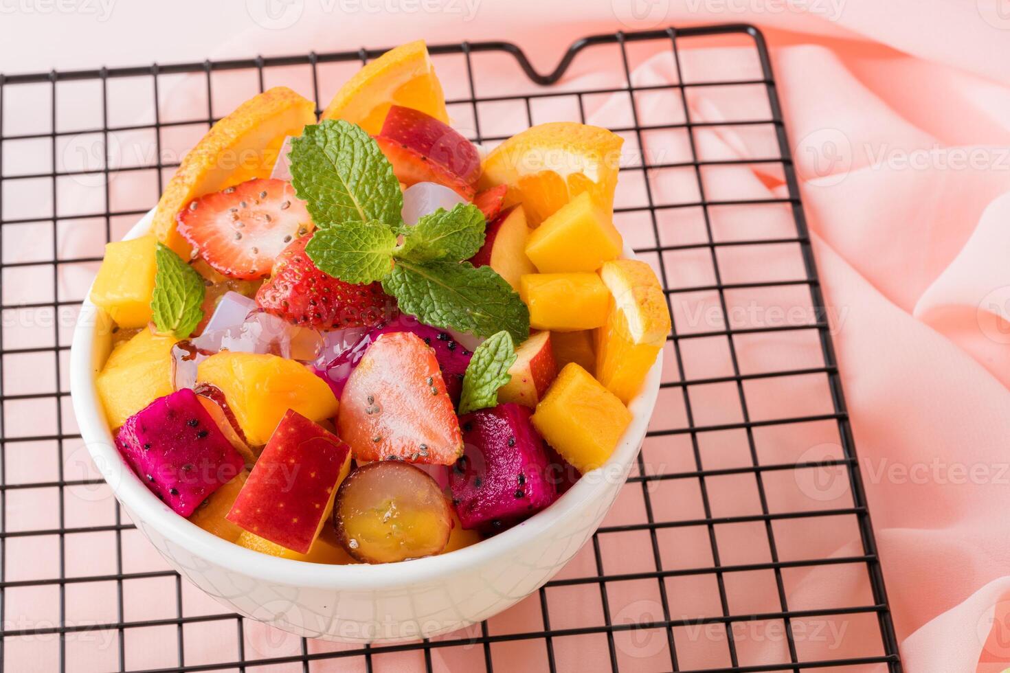 Fruit salad is a dish consisting of various kinds of fruit. fruit salad can be served as an appetizer, a side salad, or a dessert. photo