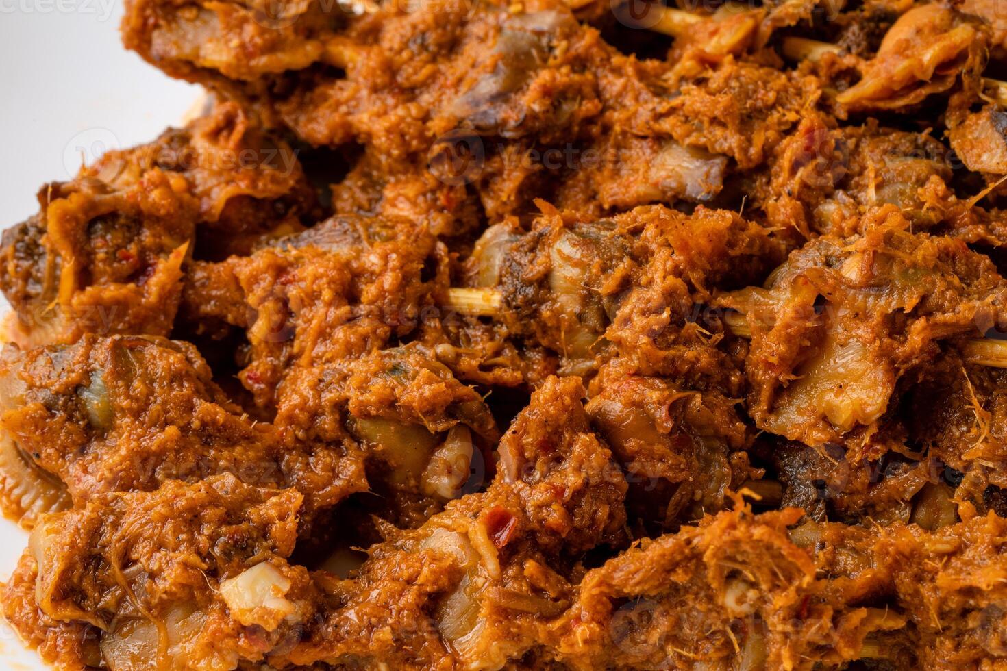 Sate Kerang Or Satay Kerang is a Traditional Indonesian Food made from Shell and covered with sauce. Sate Kerang Angkringan. photo