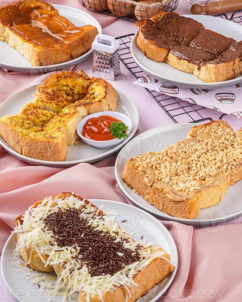 roti bakar is usually prepared as a sandwich of grilled white bread with a filling, consumed both as a light breakfast and a common street food. photo