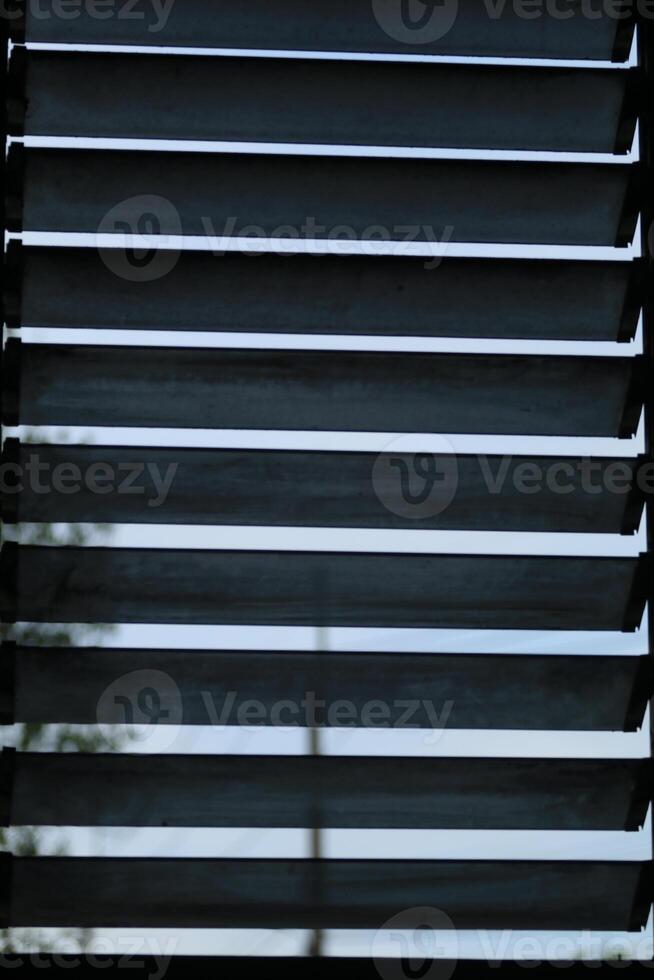 Louvered window glass for ventilation and air circulation in the room or house to cool down. photo