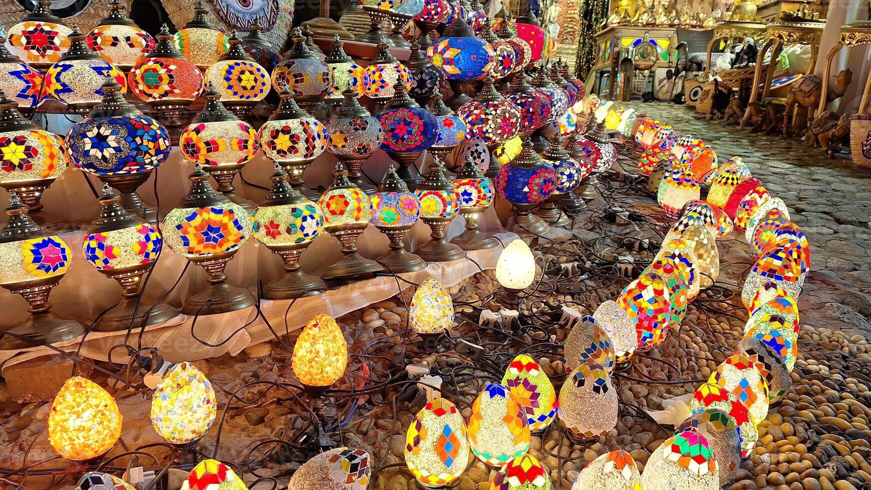 Colorful mosaic lamps, exposed in the evening on the street photo