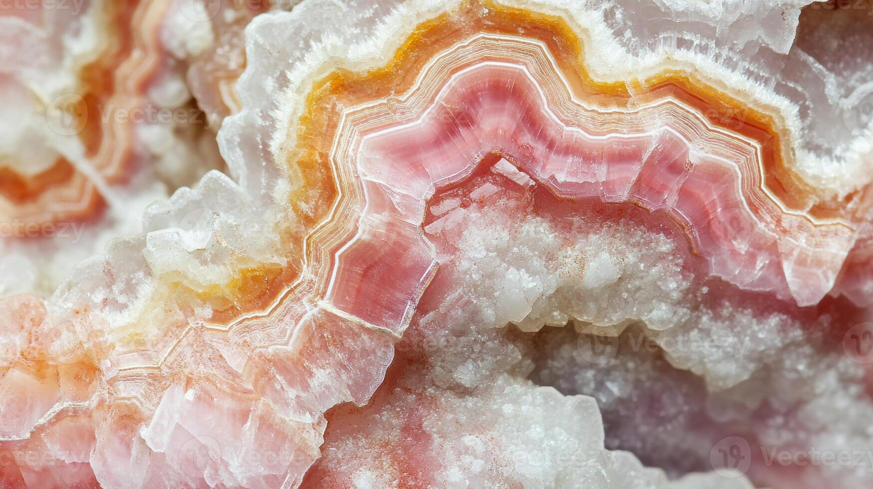 Polished rhodochrosite crystal highlighted in a macro shot, capturing its vivid pink hues. photo