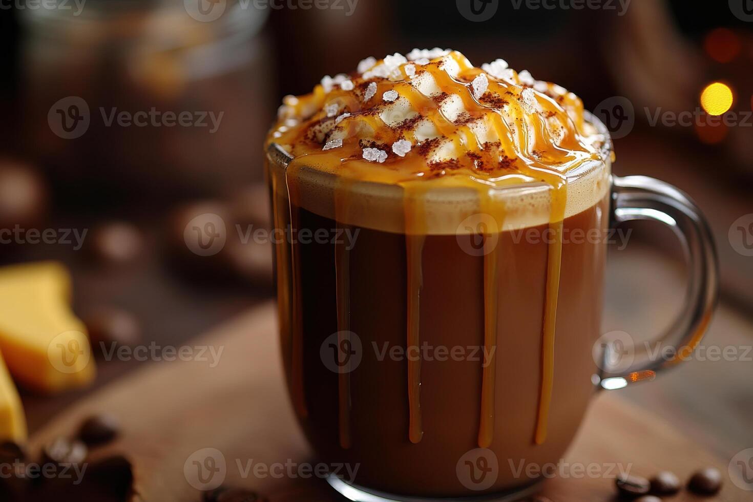 Delicious caramel latte topped with whipped cream and sprinkles photo