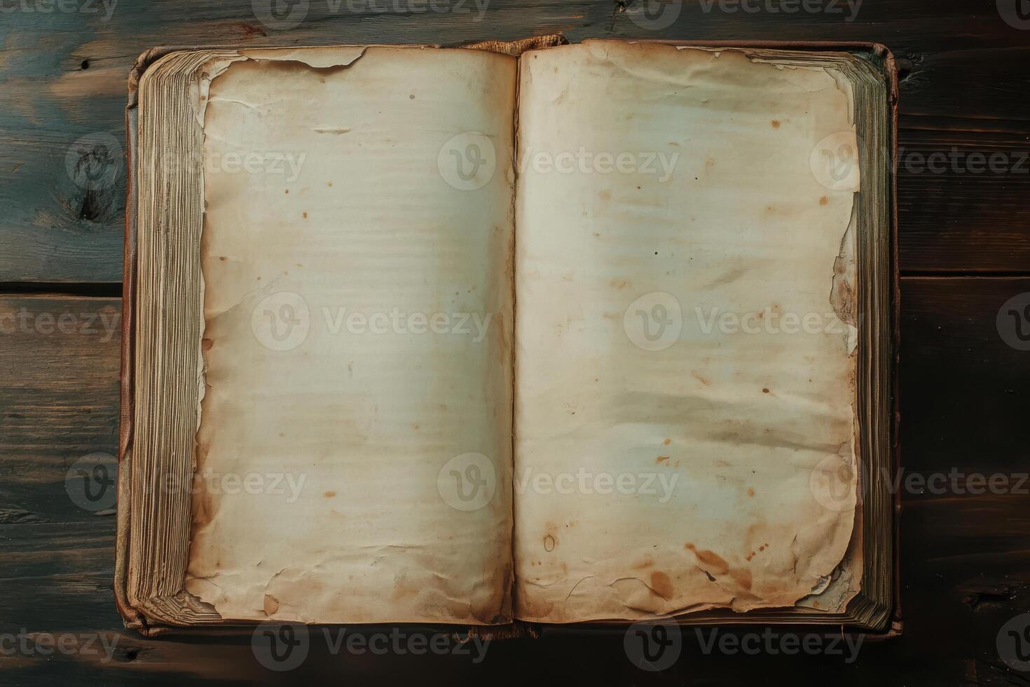 An ancient blank book resting on a rustic table photo