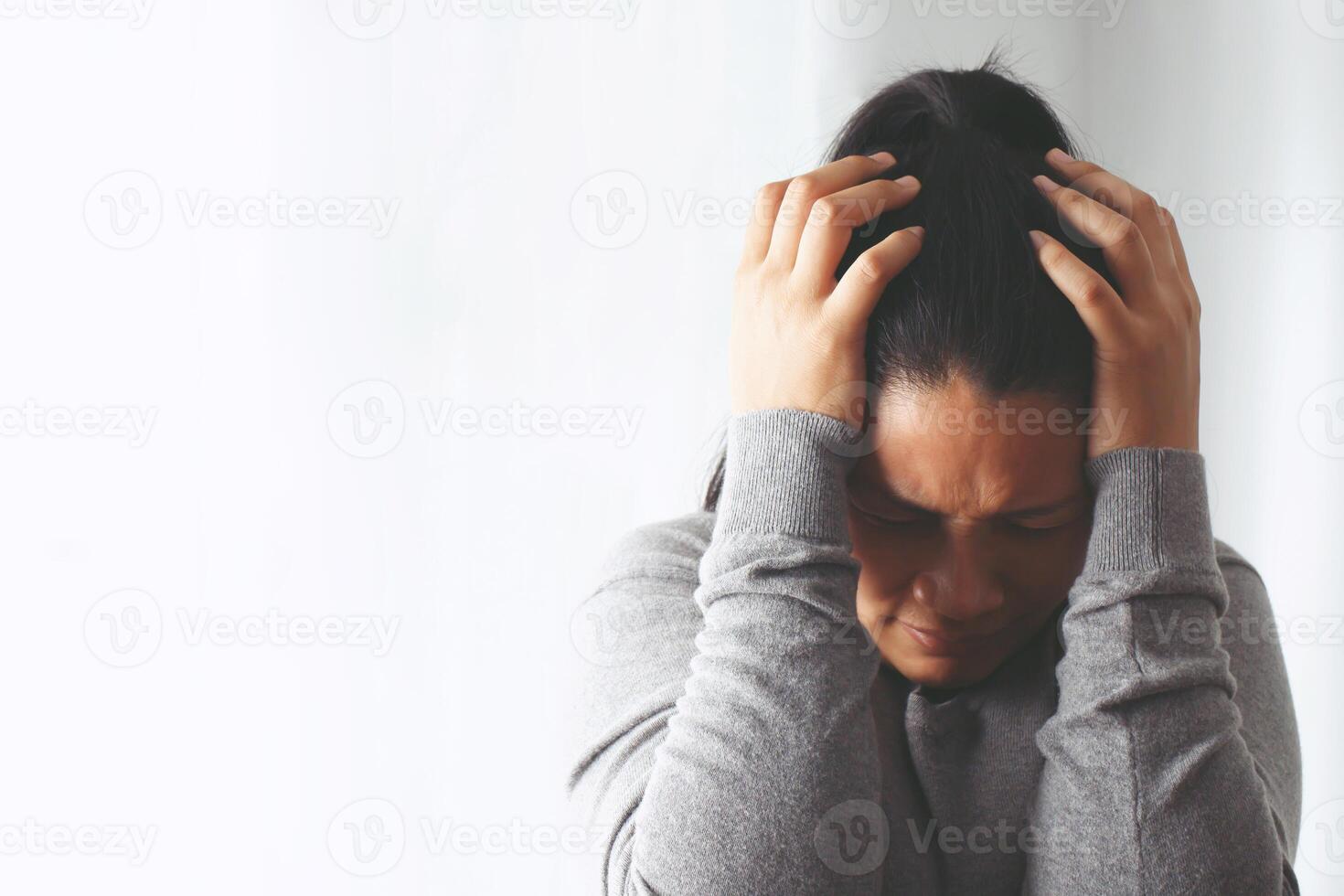 Headaches can have an underlying cause, such as insufficient sleep, incorrect eyeglasses, stress, hearing loud noises. photo