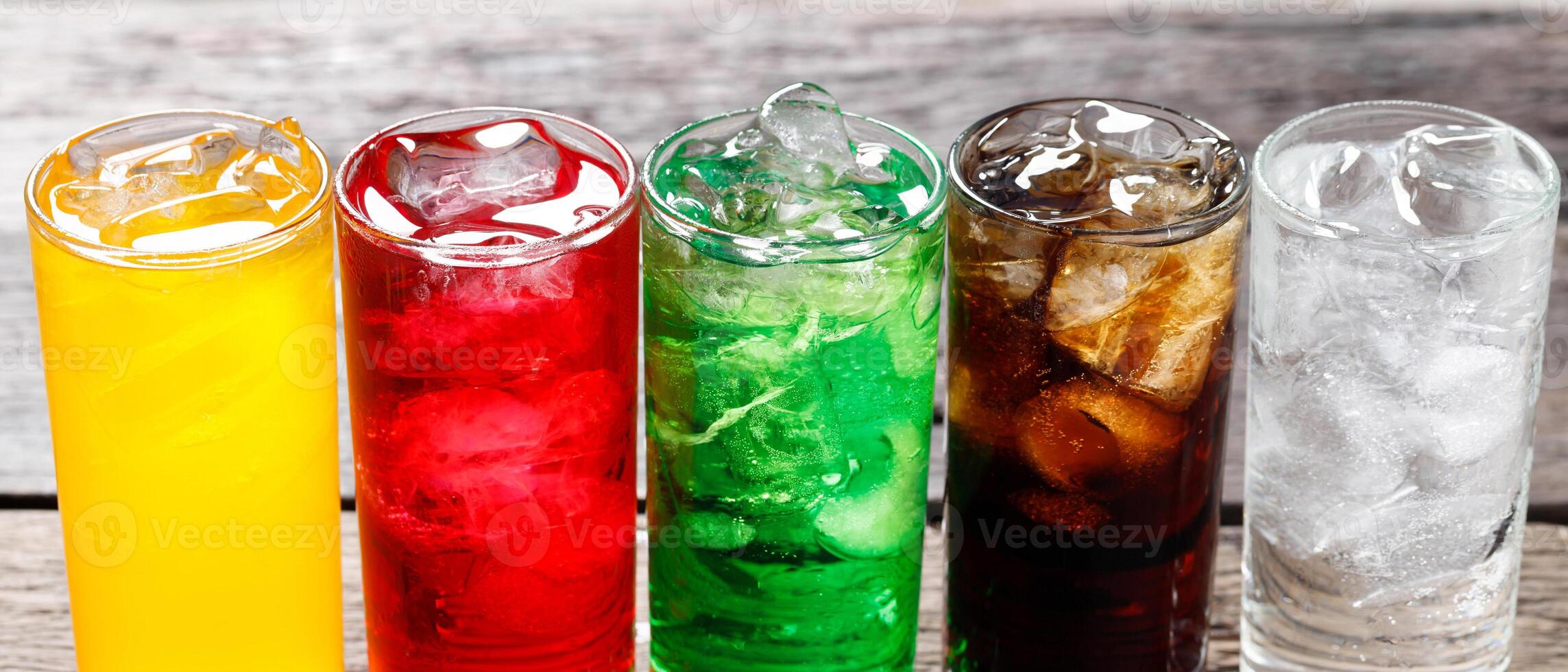 Soft drinks and fruit juice mixed with soda high in sugar have a negative effect on physical health photo