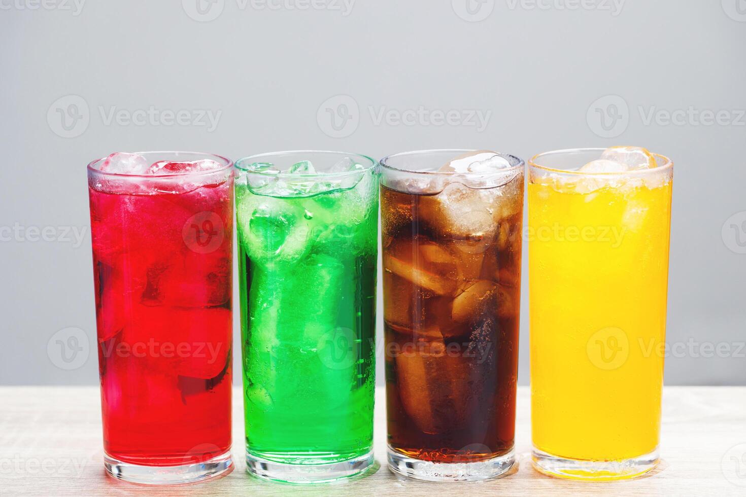 Soft drinks and fruit juice mixed with soda high in sugar have a negative effect on physical health photo