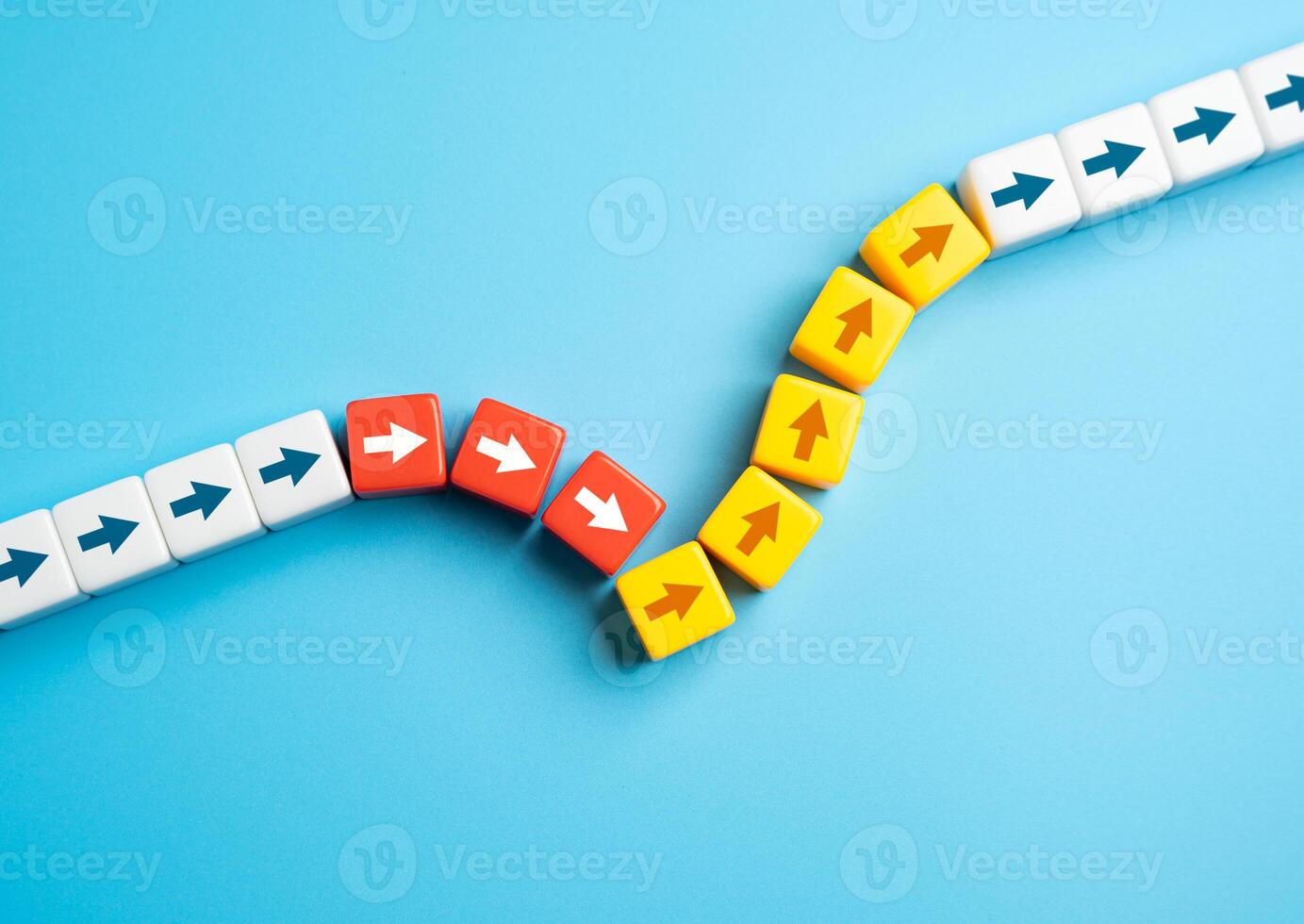 The arrows form a graph of decline and recovery. Correct the situation, get back on track. Optimistic forecast. Exit from recession. Economy and budget balance. Implementation of reforms photo