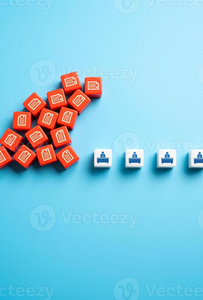 A tsunami of bureaucracy and paperwork threatens to paralyze the work of officials and government bodies. Decentralization, optimization and automation. Reducing bureaucracy in document flow. photo