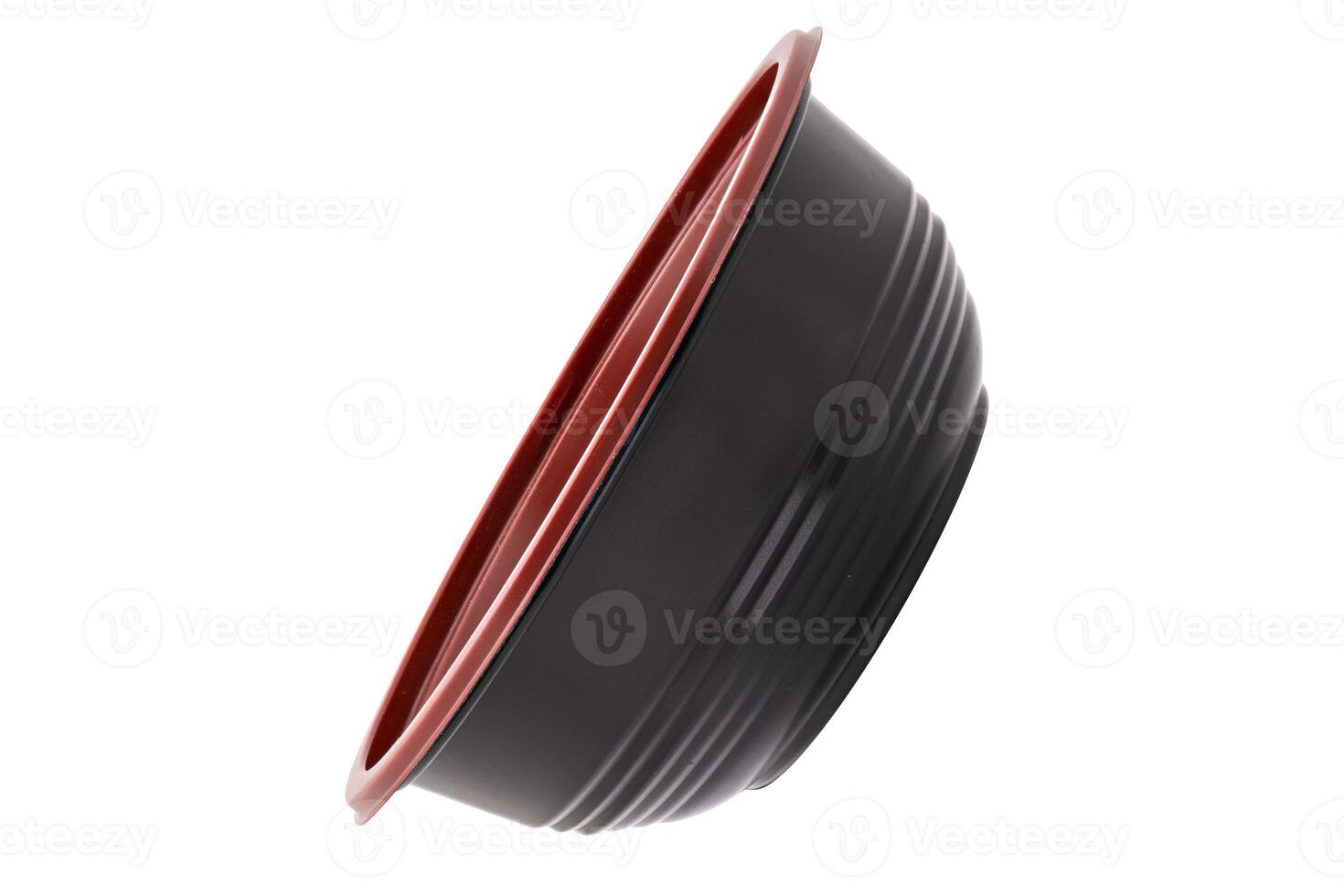 Black and Red plastic plate for food and salad isolated on white background photo