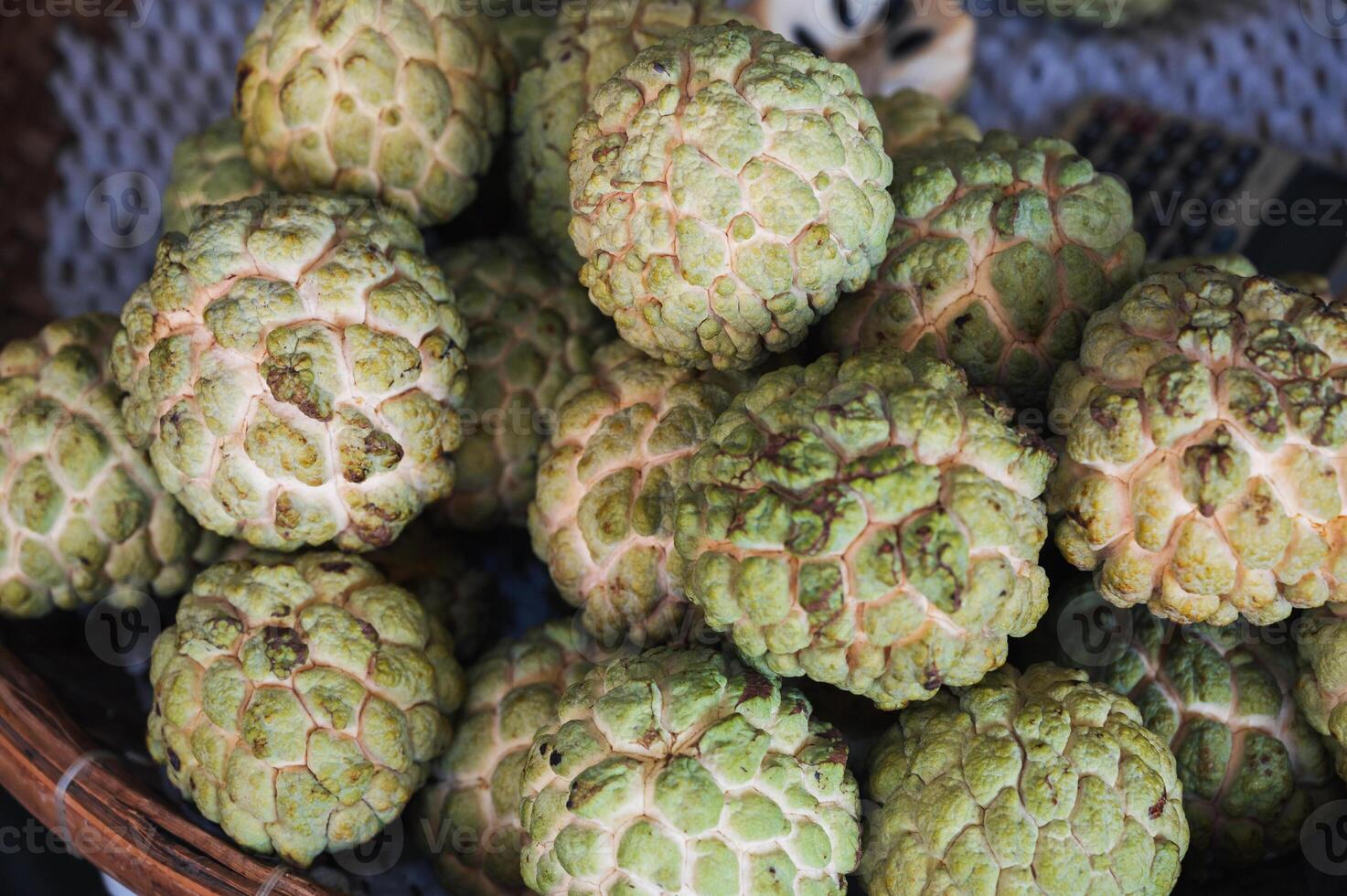 Close-up of Tropical fruits green peel custard apple photo