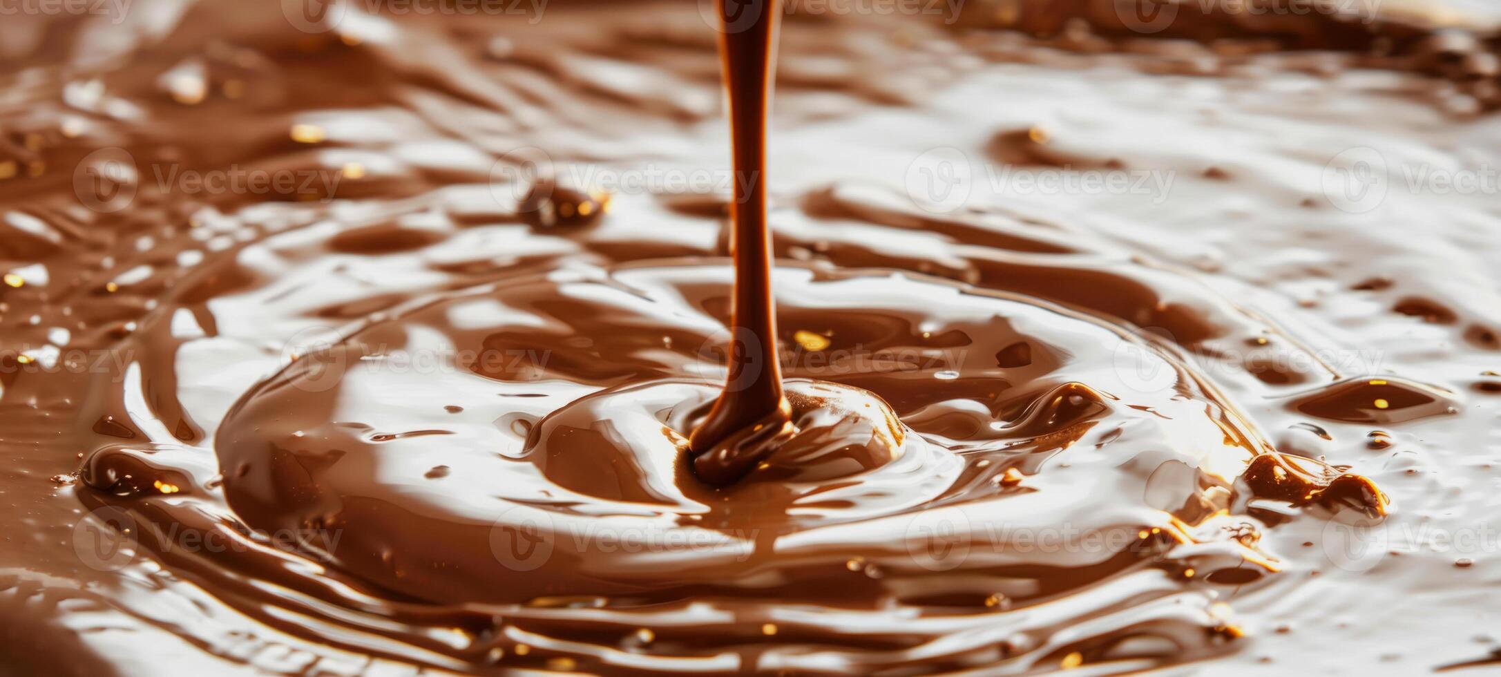Close-up of molten chocolate being poured and creating ripples. Concept of dark chocolate, dessert preparation, indulgence, and food photography photo