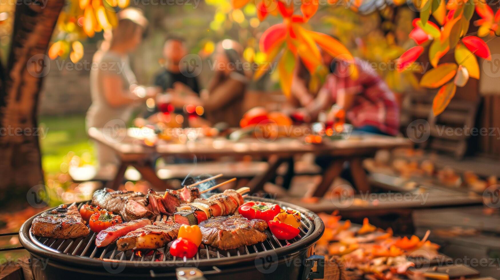Outdoor autumn barbecue with grilled meat and vegetables. Concept of outdoor cooking, grilling, social gathering, and seasonal fall activities photo