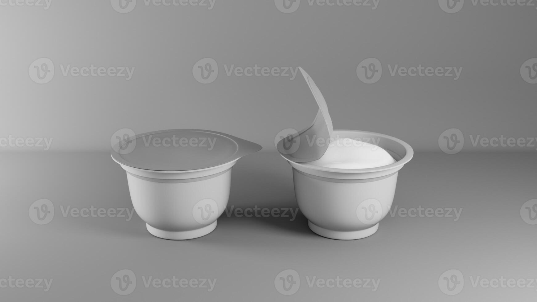 Two yogurt cups with open yogurt on gray background photo