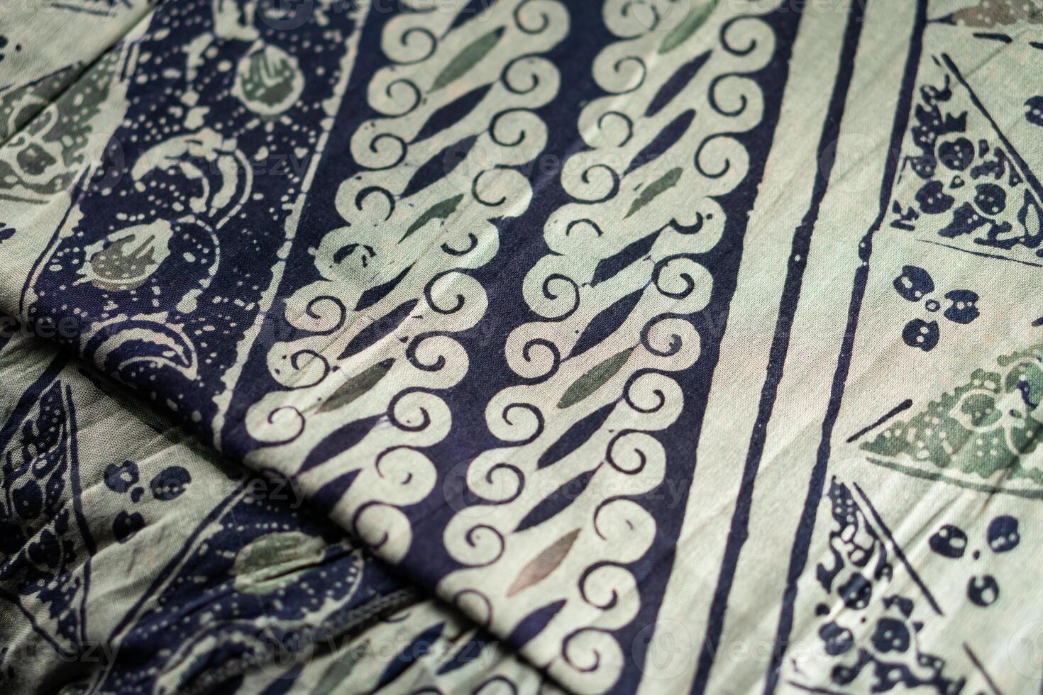 A close up of a blue and white patterned fabric photo