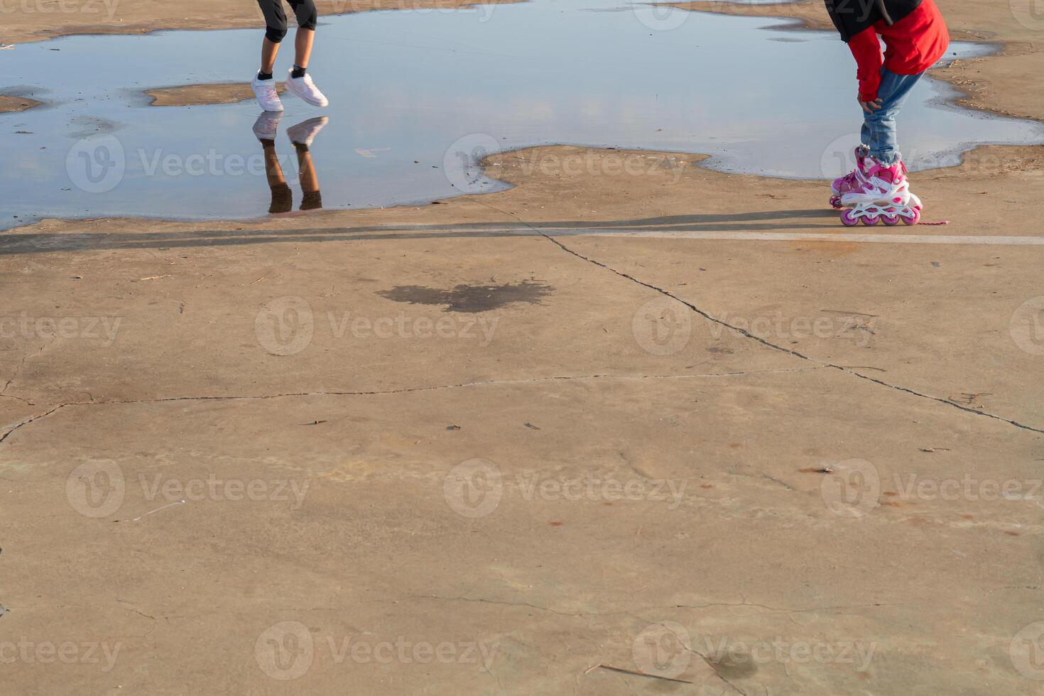 Skating on a Puddle Reflection photo