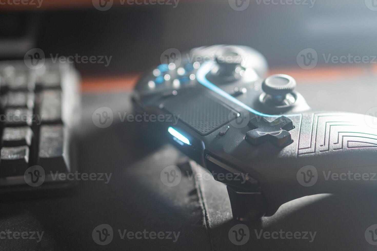 Close-up of a Hand Holding a Gaming Controller photo
