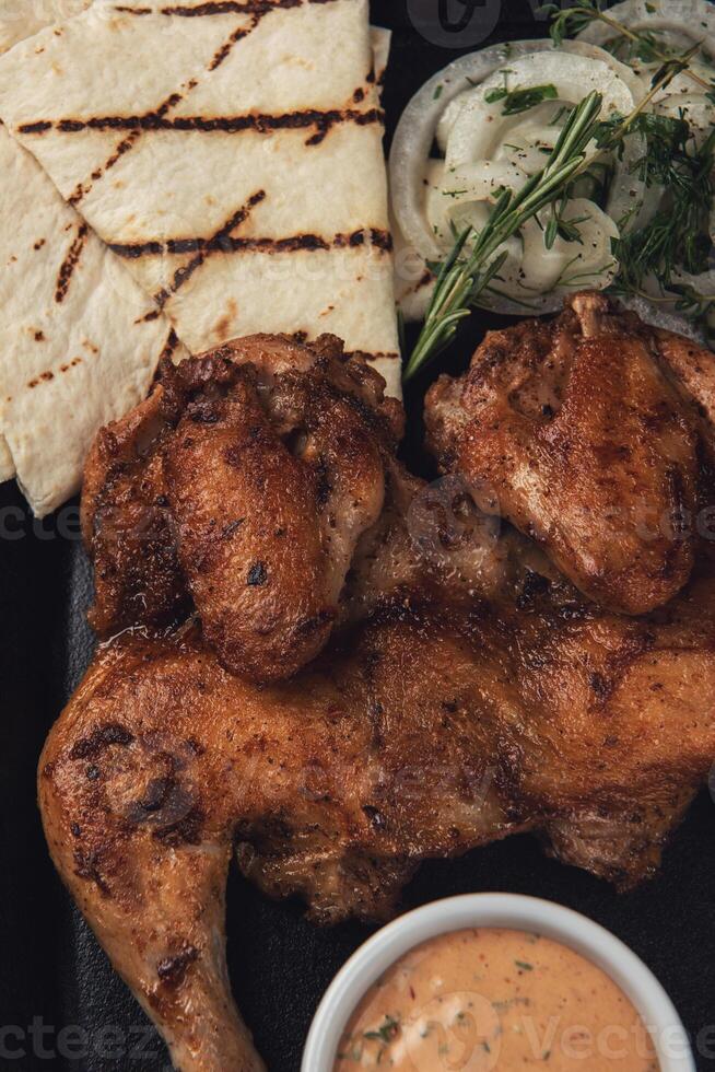 Appetizing grilled juicy chicken photo