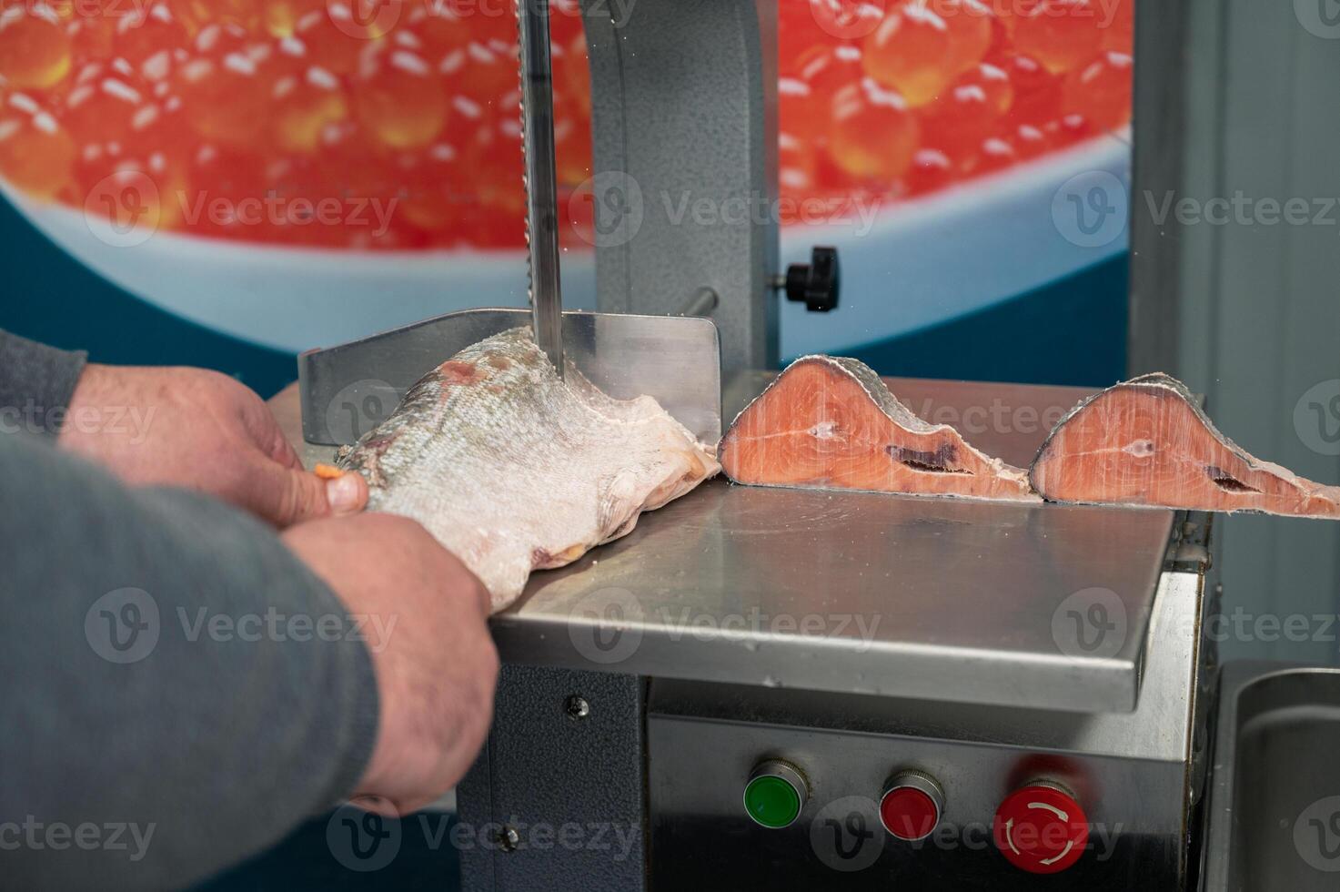 Service for cutting fish on a steak in a fish supermarket photo