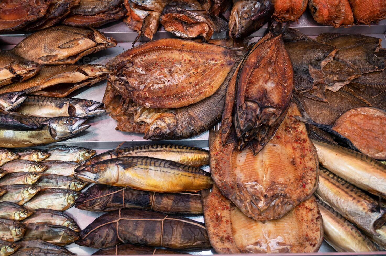 Various smoked fish products photo