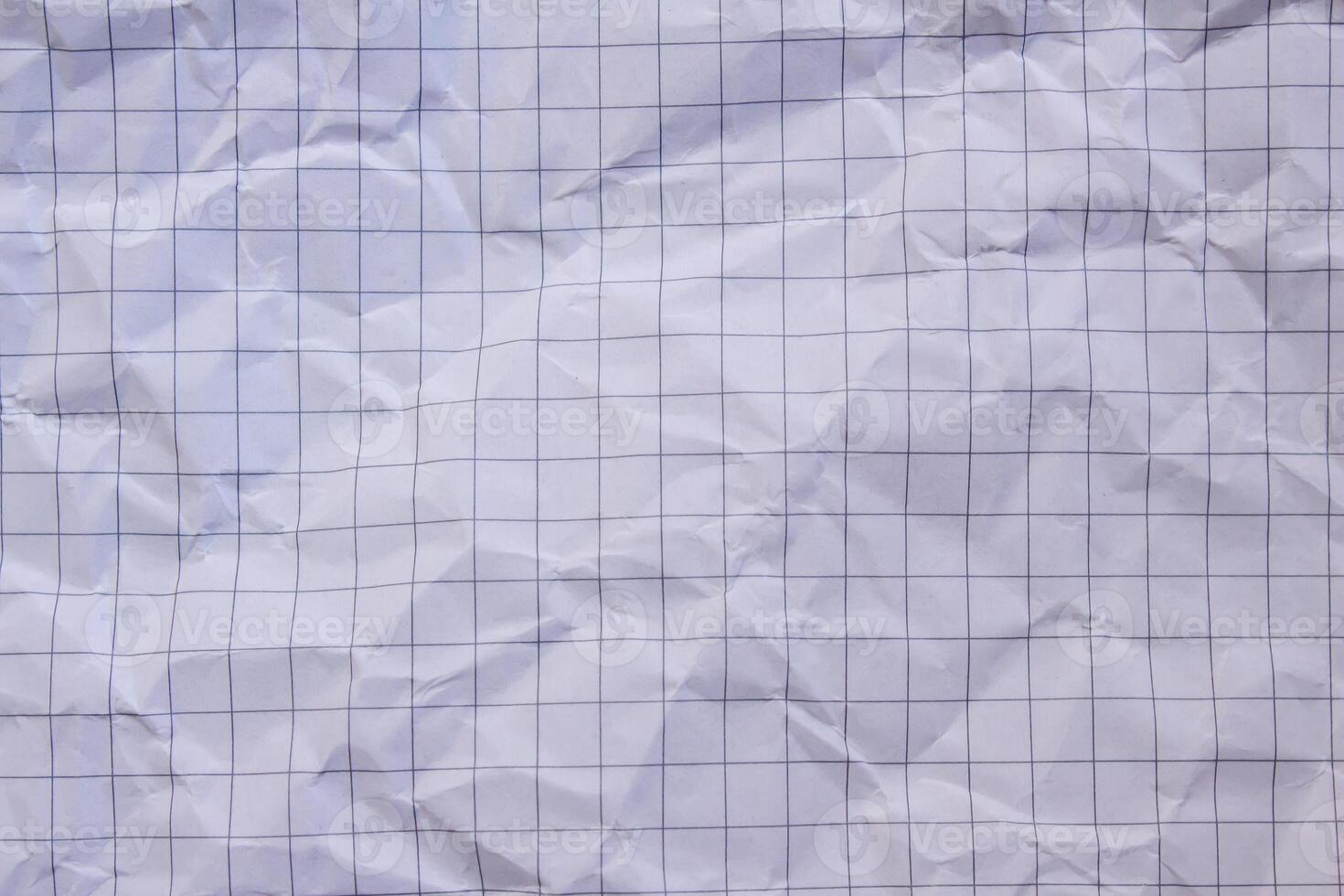 A sheet of paper with a grid pattern photo