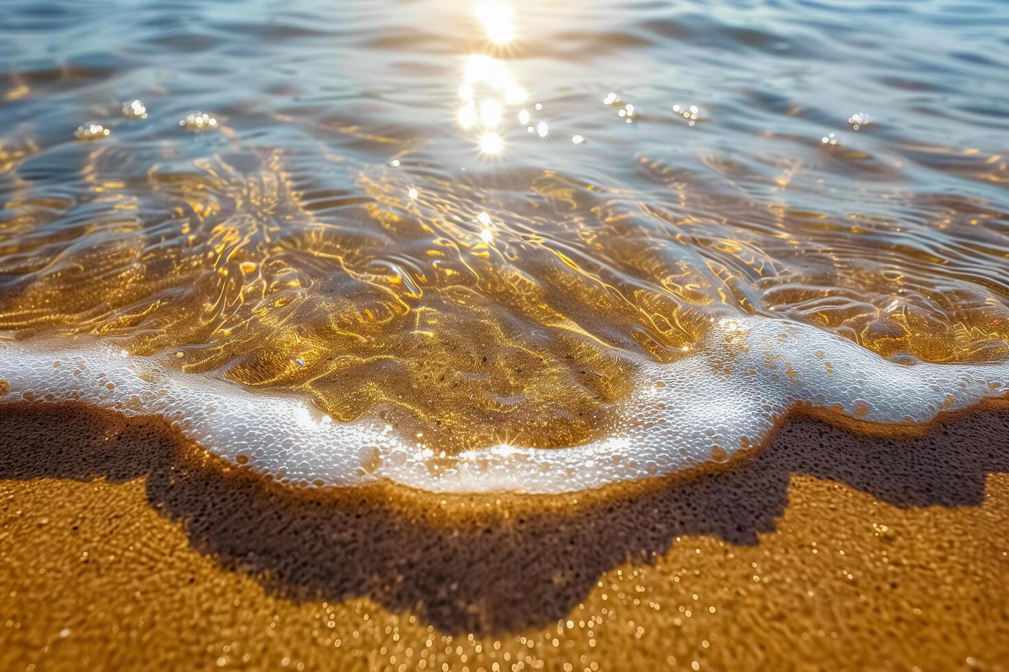 The sun is shining on the ocean and waves photo