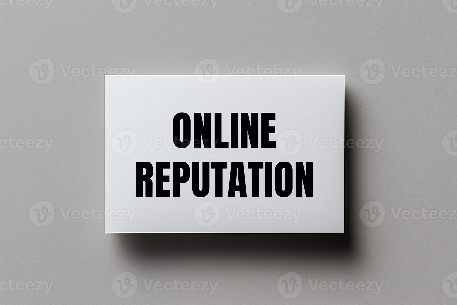 Online reputation message written on white card with gray background. Conceptual online reputation symbol. Copy space. photo