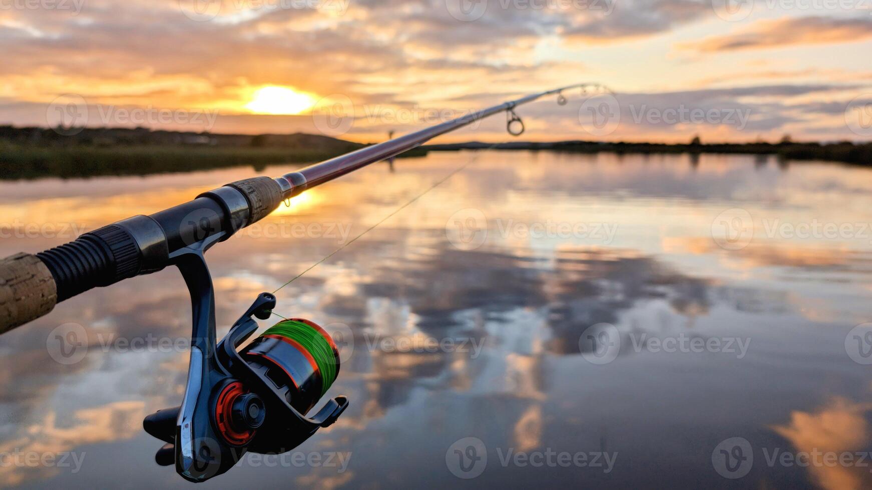 Hand holding fishing rod and reel, sunset fishing at Corrib river at Galway, Ireland, spinning, angling, catch and release, sport and leisure, nature background photo