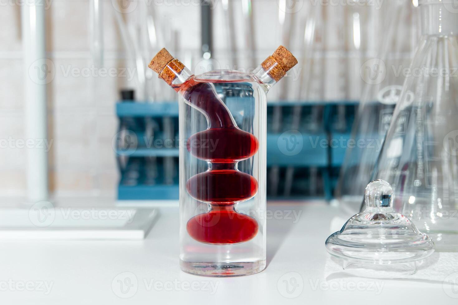 Glass combination container designed for mixing multi-colored liquids photo