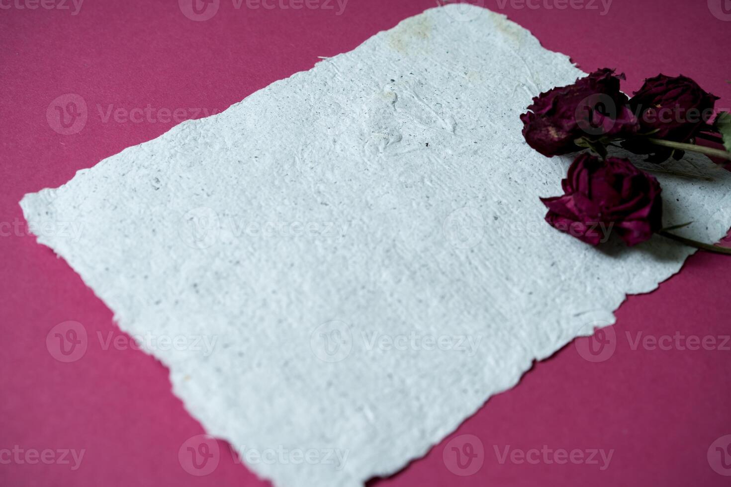 A sheet of paper made of recycled paper. Secondary production. Making paper with your own hands at home. photo