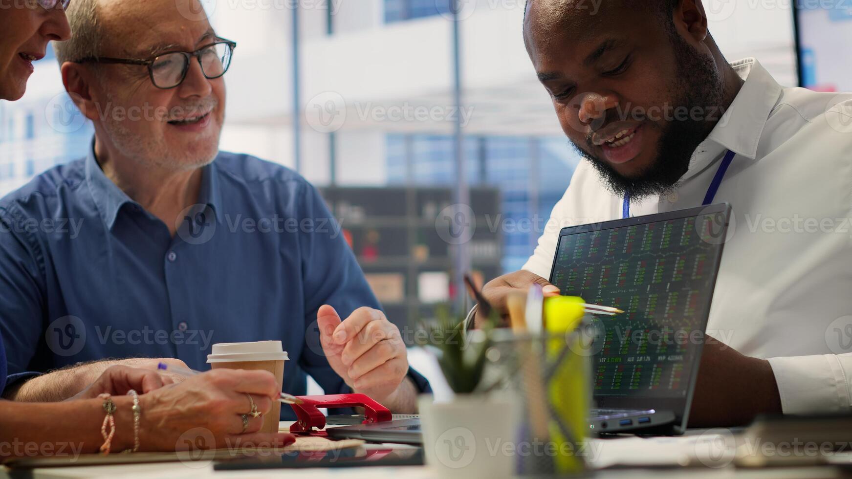 Elderly couple consulting with a financial advisor to create a detailed retirement plan, focusing on savings, investments and ensuring a comfortable future. Life insurance and finances. Camera A. photo