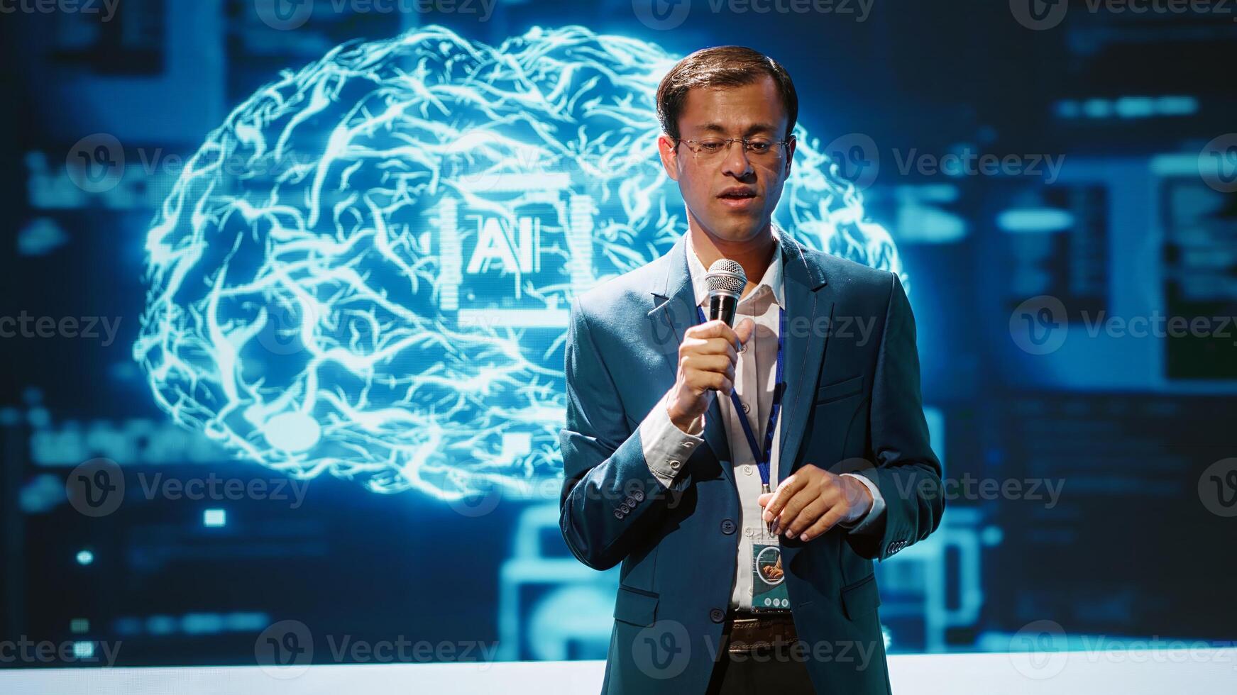 Speaker does presentation during tech conference, exploring successful implementation of AI in driving forward startup businesses, sharing latest machine learning discoveries, camera A photo