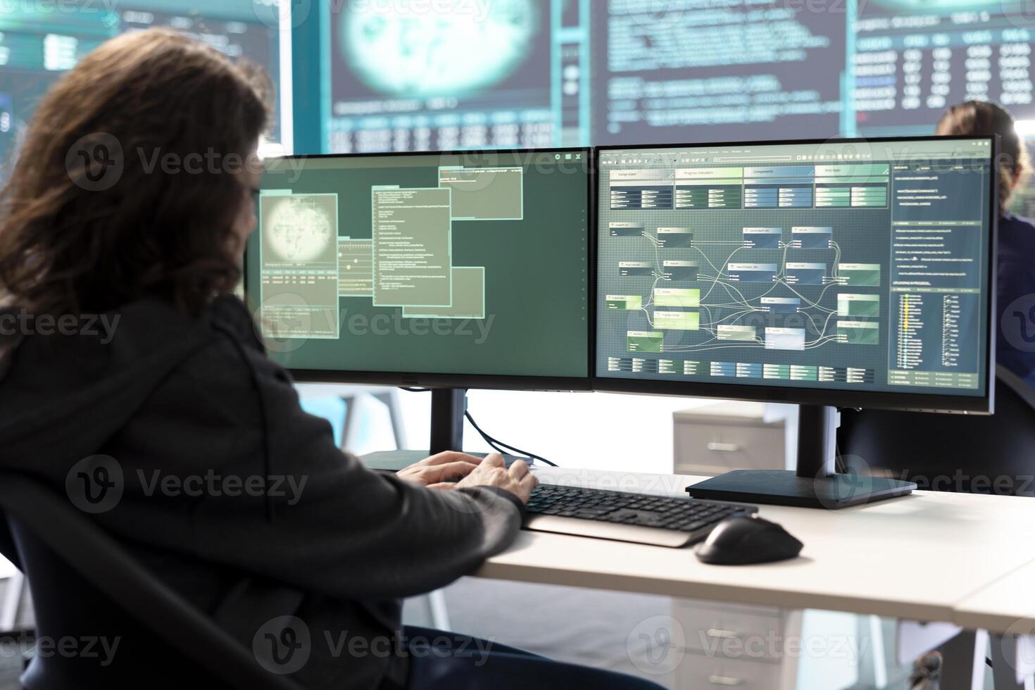 Governmental hacker expert working on securing digital information, analyzes intelligence on big screen. Specialist works to prevent cyber threats with advanced technology, cyberterrorism. photo