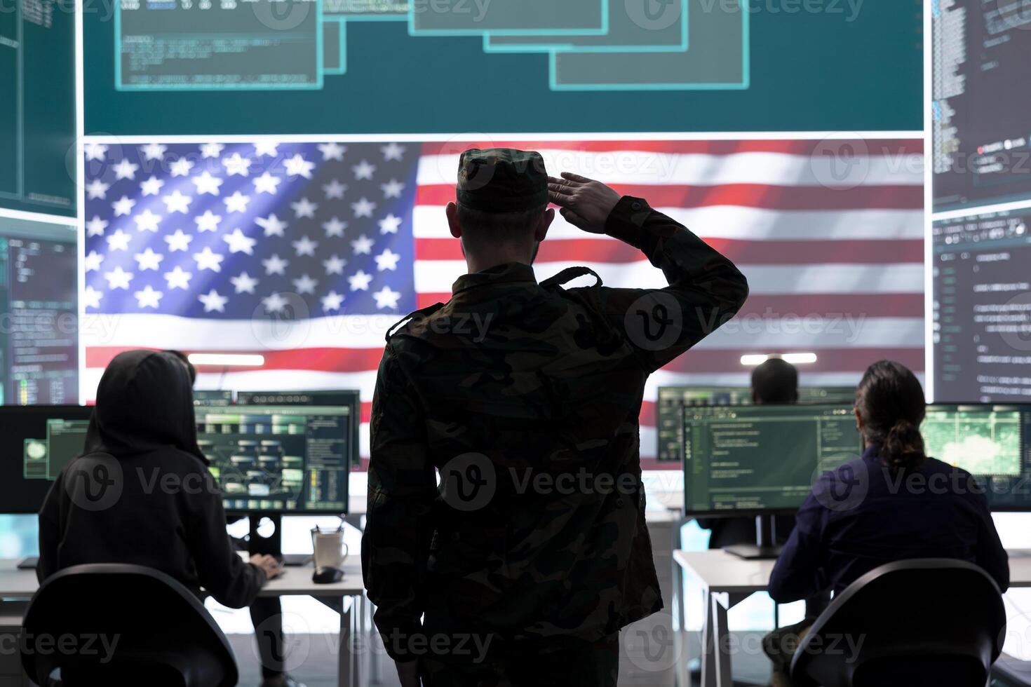 United States army soldier presenting his salute in government monitoring room, working on intelligence gathering from servers breach. Military personnel on duty during cyber warfare. photo