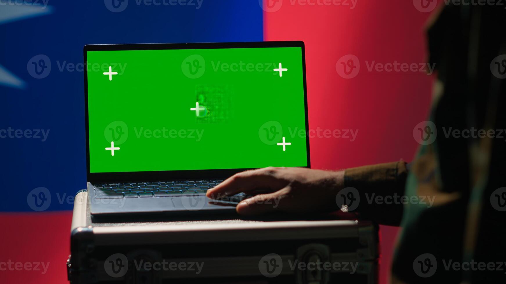 Taiwanese air defense operator uses radar on green screen laptop conducting satellite tracking. Taiwan insurgent uses military software on mockup device, preventing rockets, camera A photo