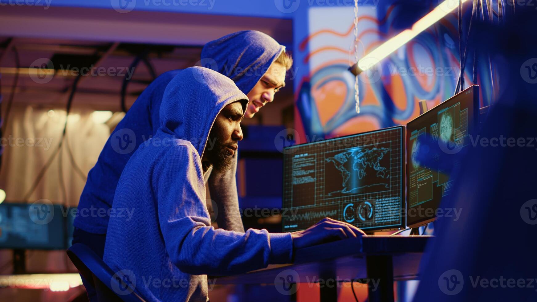 Hacking group in underground bunker trying to infiltrate another country government security systems in international espionage effort, struggling to get past firewall with their cyber attack photo