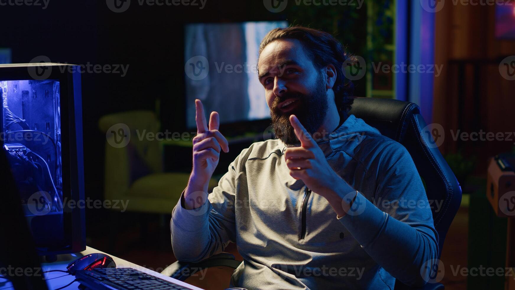 Content creator playing online multiplayer videogame on gaming PC, contending against other live esports pro players. Professional gamer streaming game for spectators from home photo