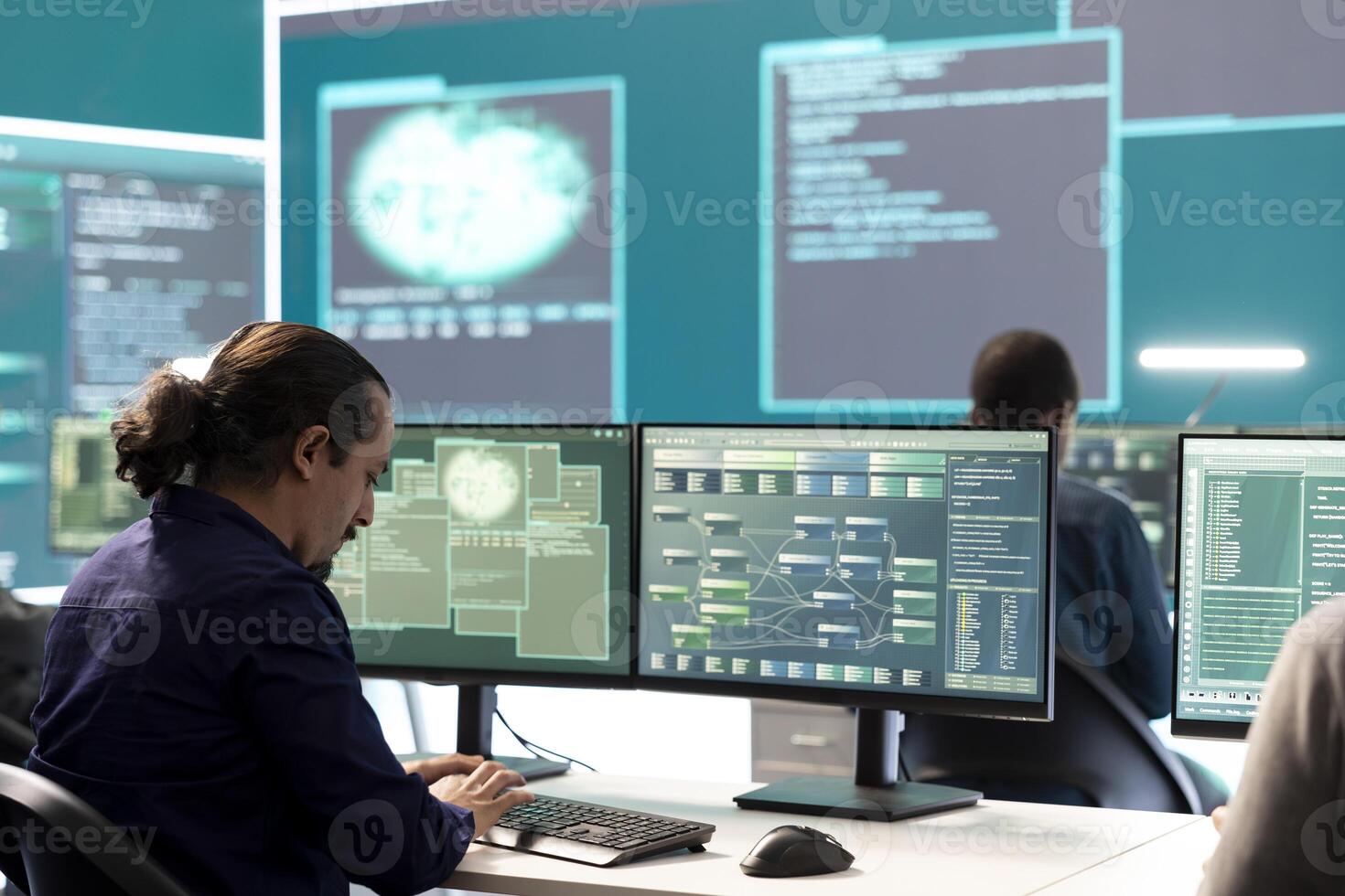 Professional IT expert working in a governmental security operations center, analyzing data on a big screen. Highlighting the importance of cyber security monitoring and threat analysis. photo