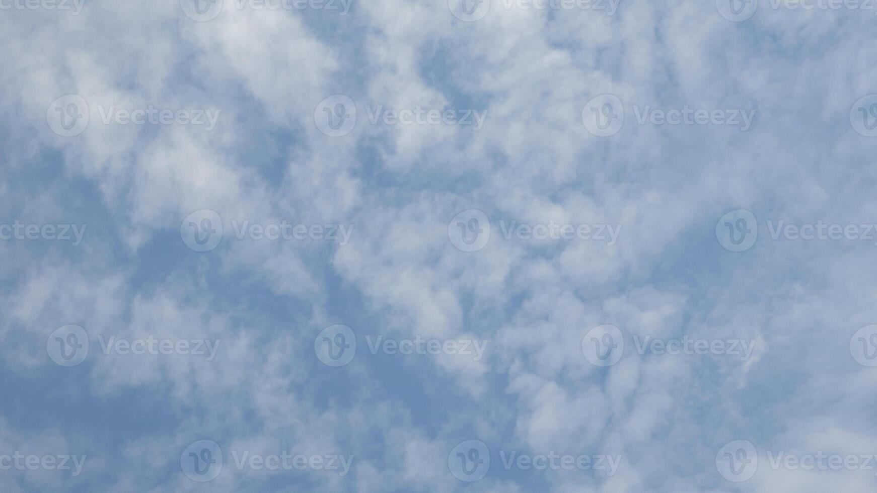 Blue sky background with tiny clouds, Nature cloud blue sky background, Blue Sky with Fluffy White Clouds on a Sunny Summer Day photo