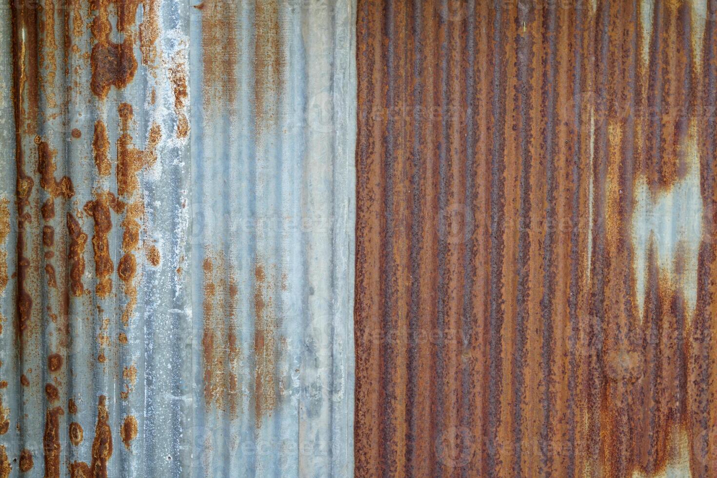 Old galvanized sheet background with rust pattern. Used for decorating the walls of restaurants, coffee shops, vintage style, cowboy style, backdrop. photo