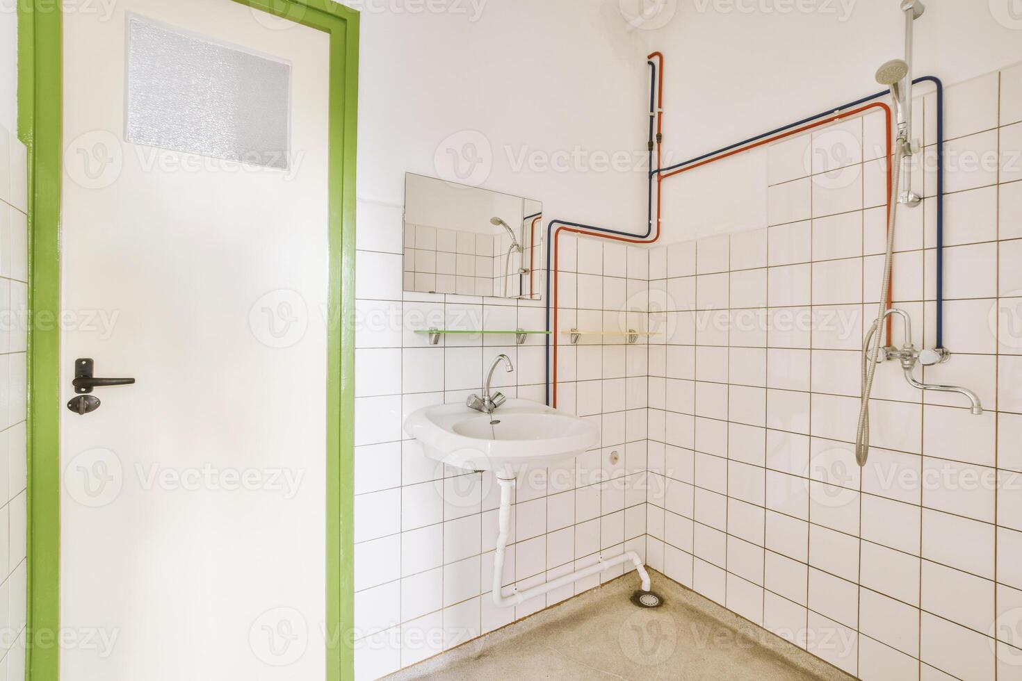A bathroom with a sink, toilet and shower photo