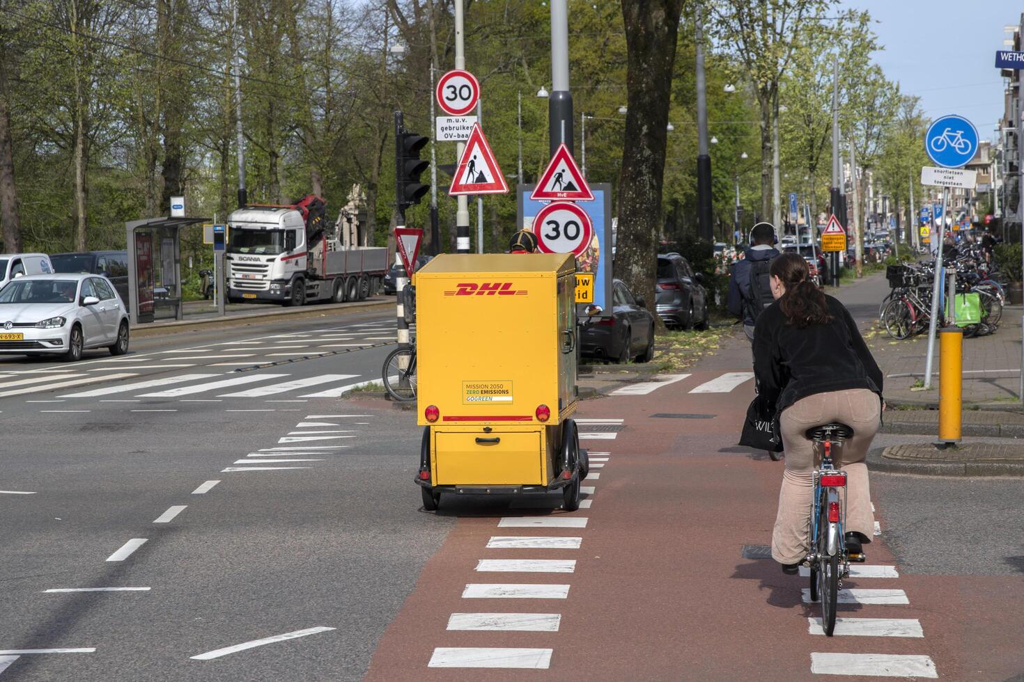 Backside Delivery Bicycle At Amsterdam The Netherlands 12-4-2024 photo