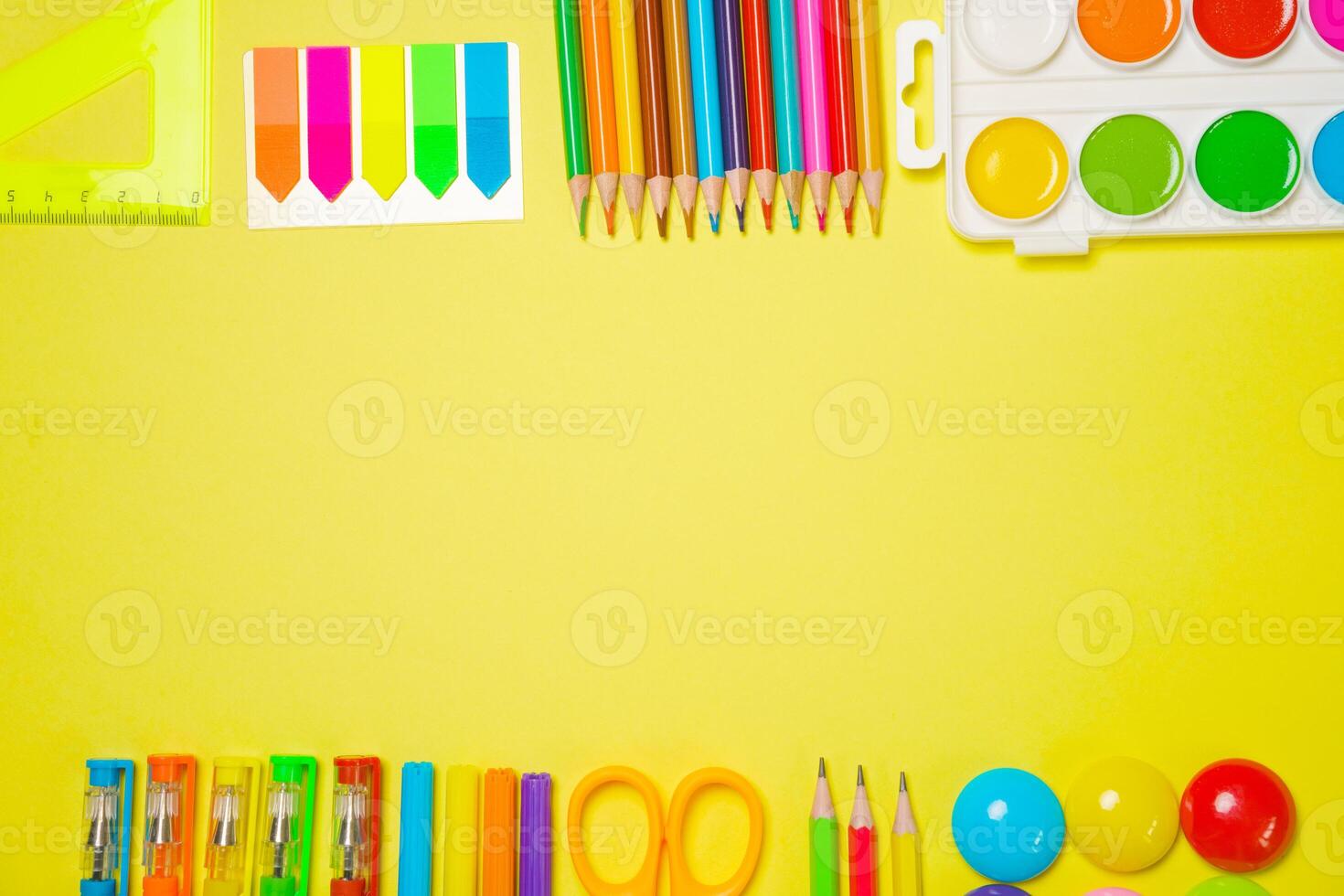 School supplies for drawing, paints colored pencils and pens paper stickers photo