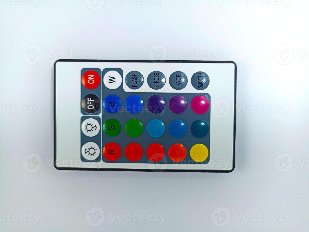 small infrared remote control keyboard for led color equipment, rgb lighting, computer desktop fans and other electronic devices isolated on white background photo