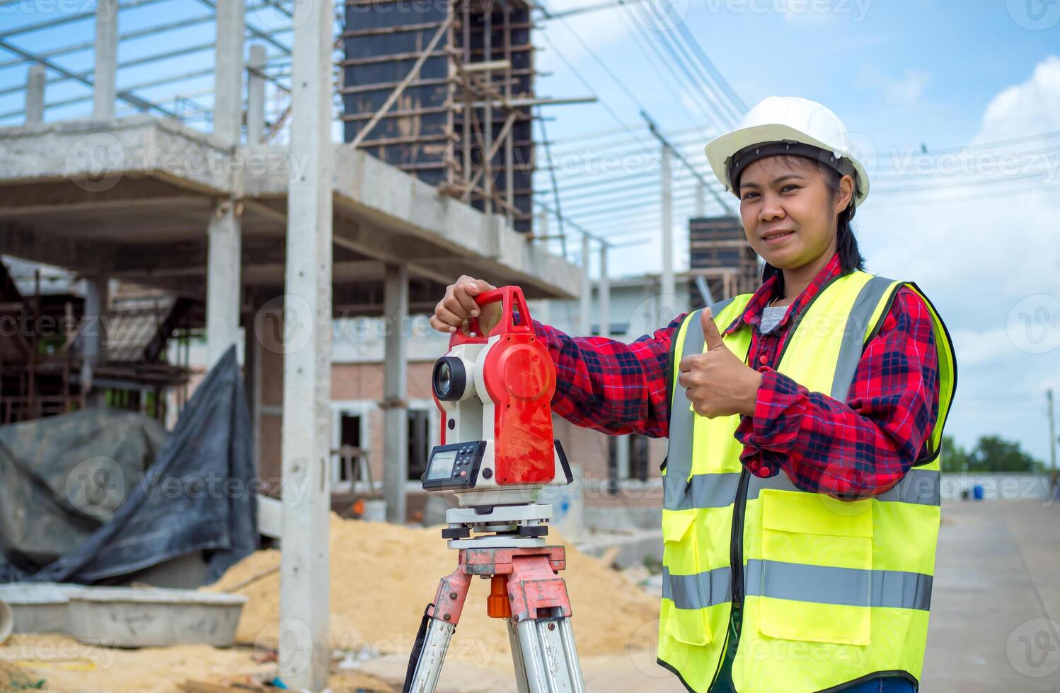 Surveyor and survey equipment on construction site, Land and soil development, Survey equipment, Theodolite for measurement construction work, Civil engineer or Architect working surveyor. photo