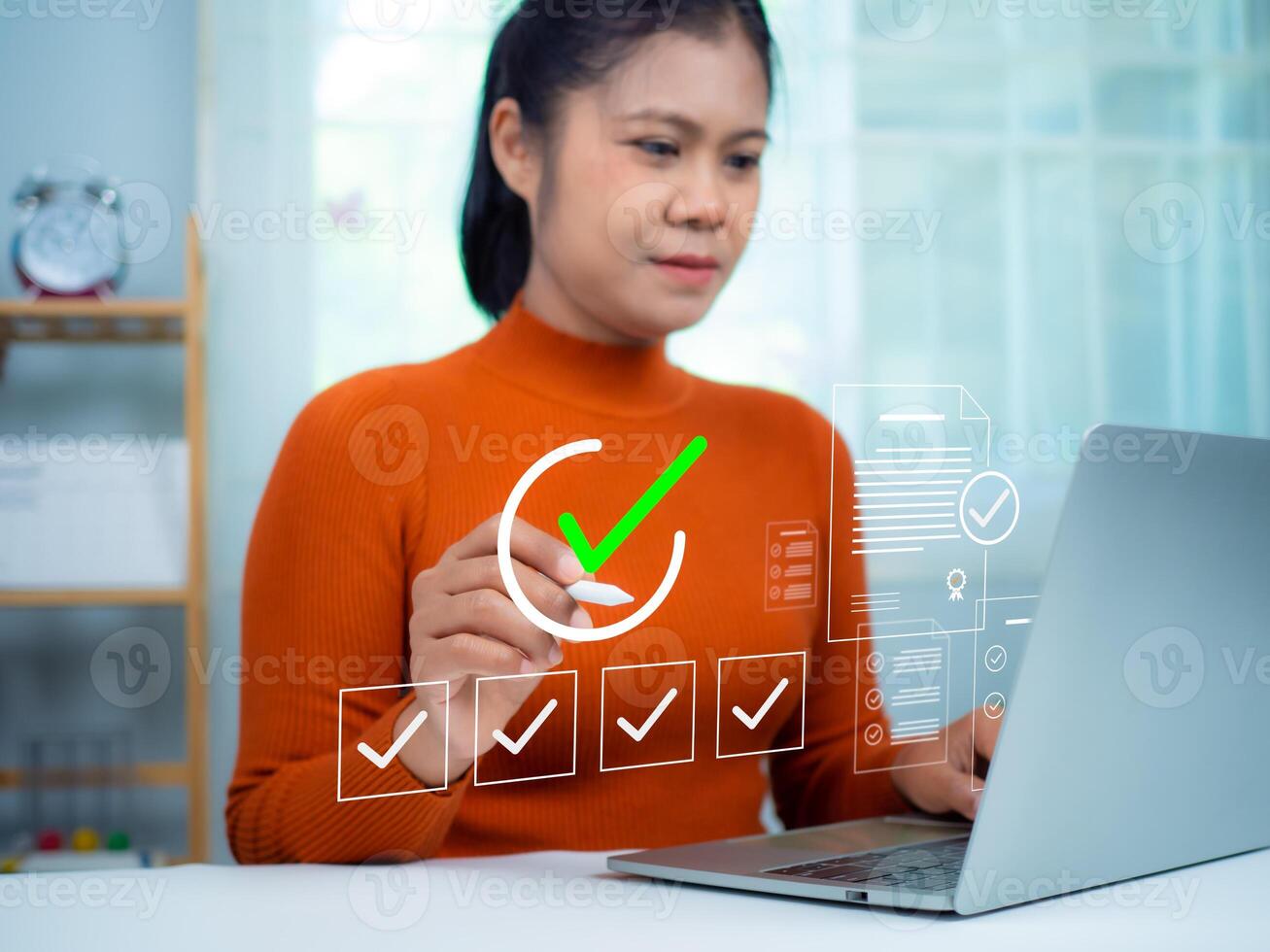 Businesswoman using a laptop. Online survey with digital forms and checklists, Technology and strategy for success in the business modern world, Transparency in organizations and companies. photo