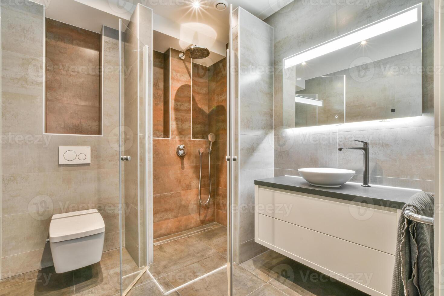 A bathroom with a shower stall and toilet photo