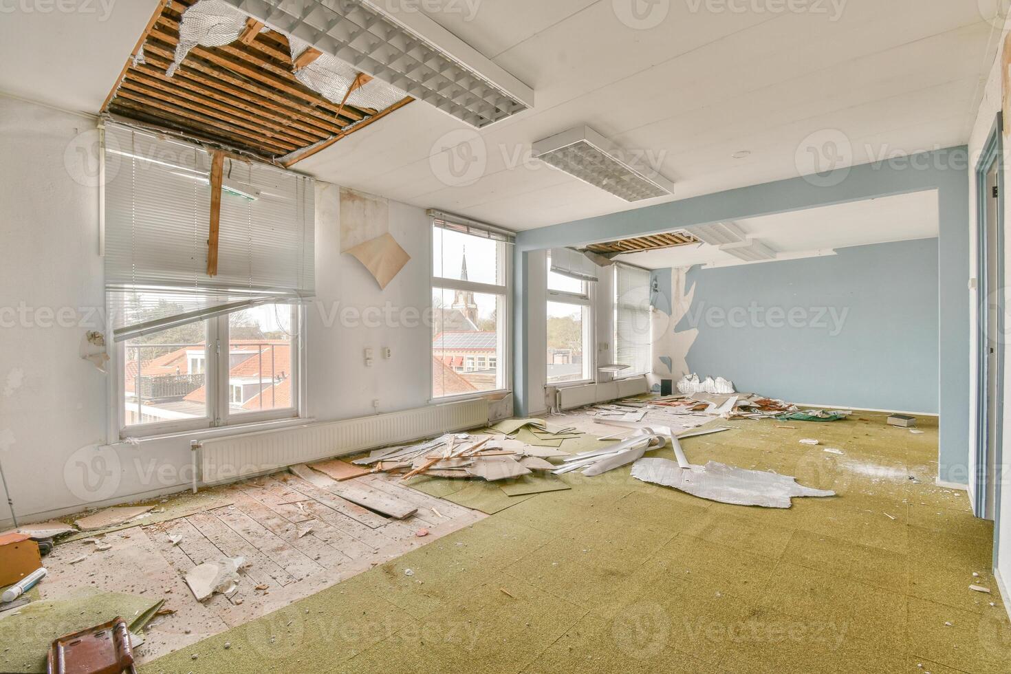 A room with a lot of debris on the floor photo
